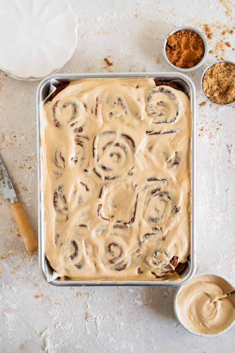 Frosted pumpkin cinnamon rolls