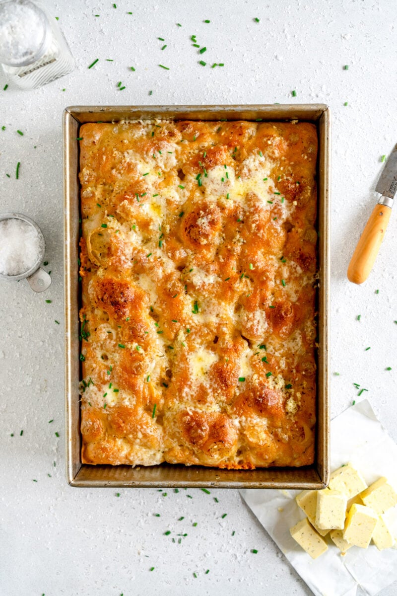 baked cheesy garlic bread in pan 