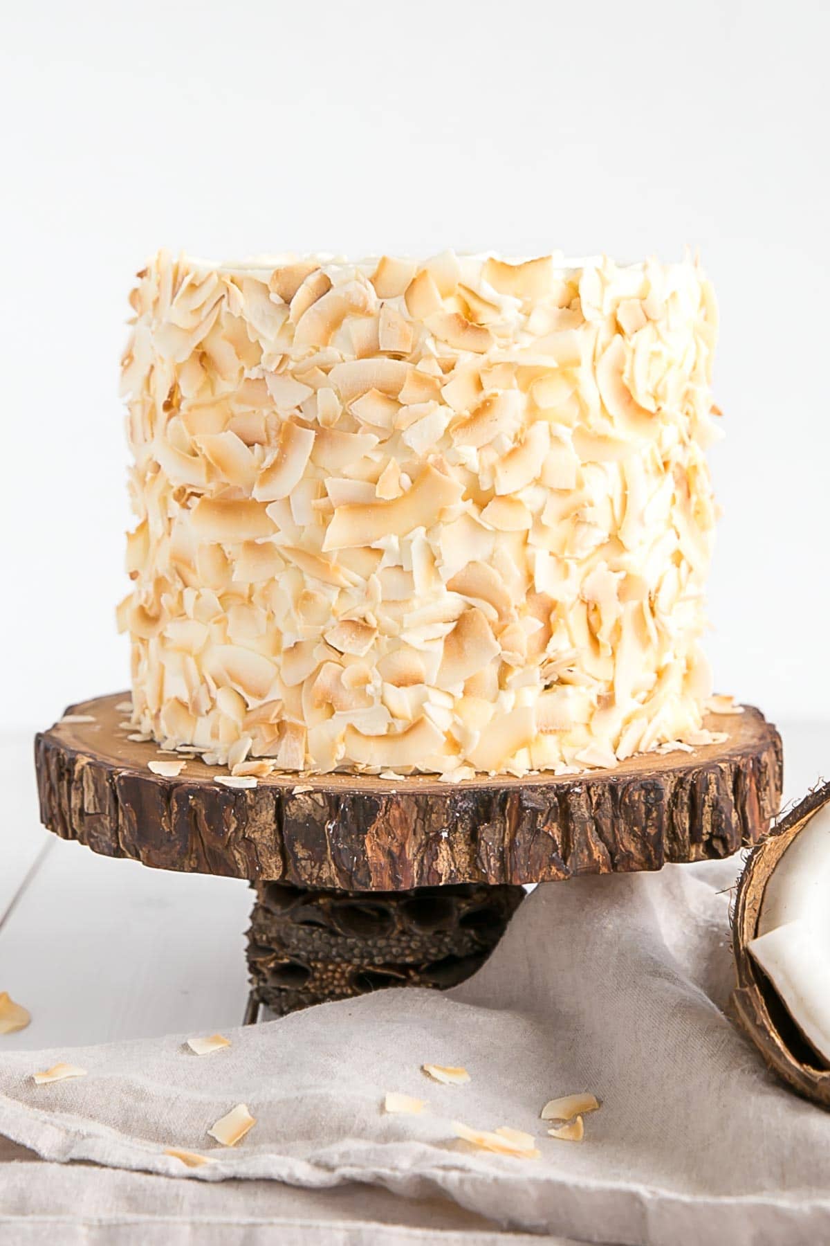 Coconut cake with toasted coconut flakes.