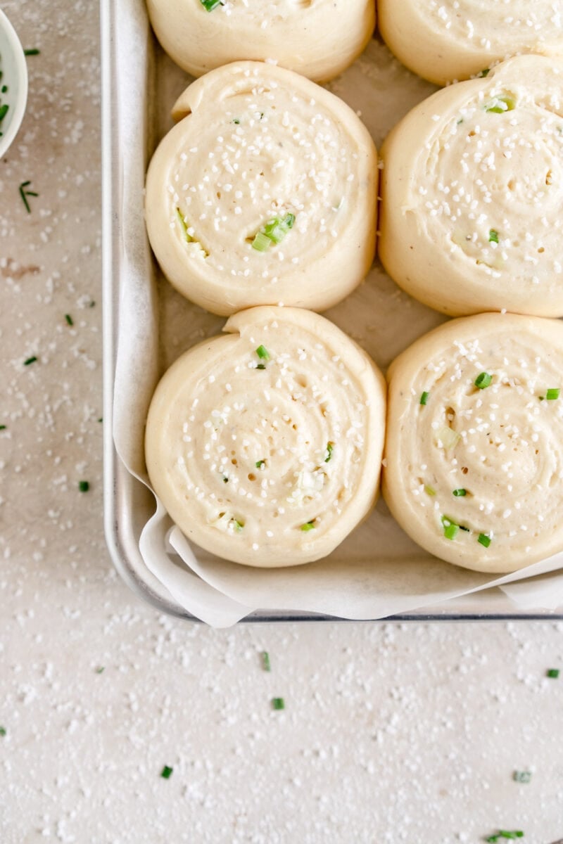 corner shot of buns with cheese and chives