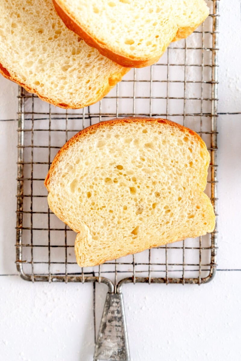 slice of white bread on rack
